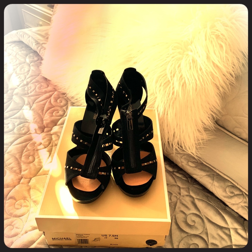 Brand new Michael Kors bootie Heels.